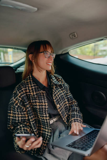 istock A Young Professional Effectively Working Remotely While Inside of a Car to Stay Productive 2184235498
