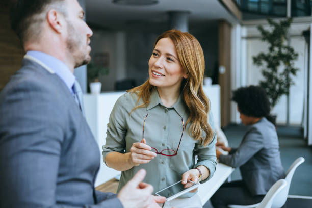 istock Female professional interacting during a meeting 2184237549