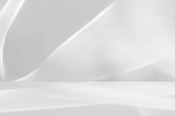 istock Abstract white studio room with light and shadow from window background for product display presentation 2184237913