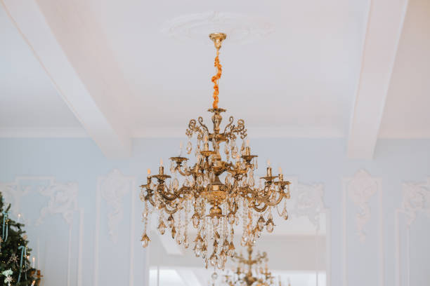 Elegant crystal chandelier adorned with intricate details and soft lighting