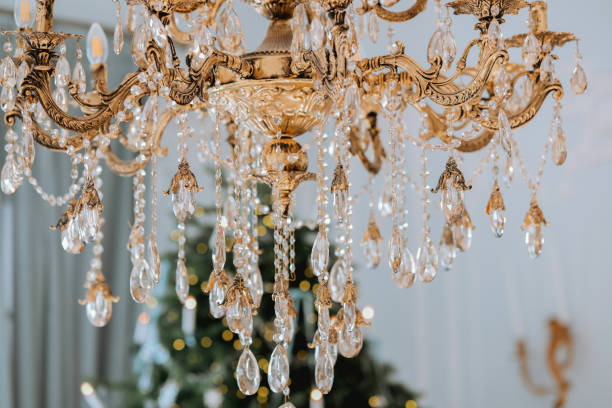 istock Elegant chandelier adorned with crystals illuminating a festive setting 2184239893