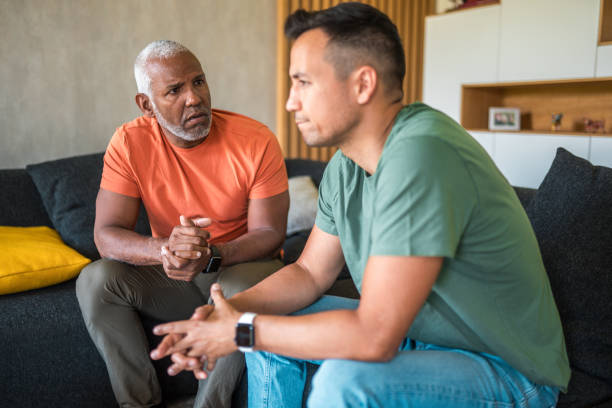 istock Attractive Male Friends Reflecting on Mental Wellbeing 2184240986