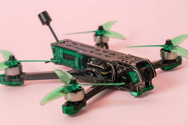 istock Close up view on modern drone with camera isolated on pink background 2184243692