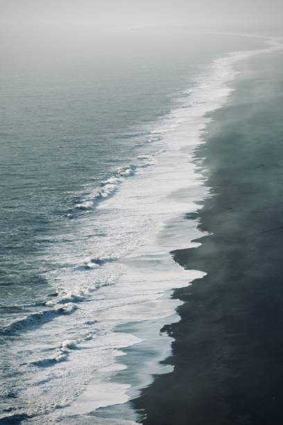 istock Iceland, black beach and the sea 2184246713