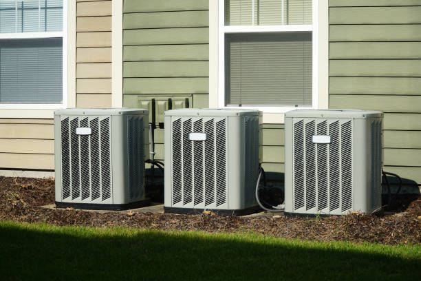 istock Air conditioner compressors outside the apartment building 2184247433