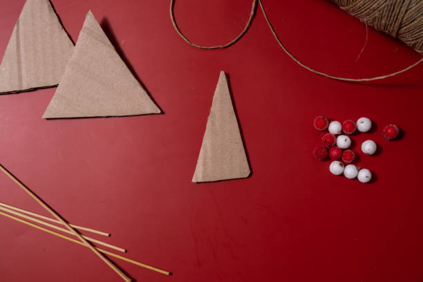 istock Rope Christmas trees Storytelling creating craft Christmas holiday present. Tactile hand-on activity. Master class progress of creative me-made gifts. Seasonal domestic life micro moment hobby 2184251937
