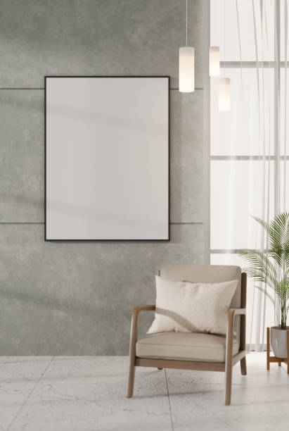 istock A modern loft living room features the cement wall with a blank picture frame mockup. 2184253740