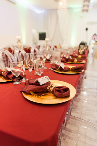 istock Festive Red & Gold Party Decorations, Table Settings & Dessert Bar 2184258084