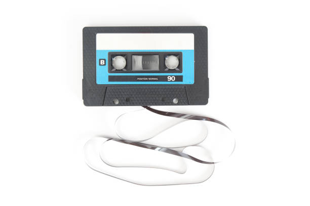 istock Old vintage audio cassette close up isolated on white background 2184267134