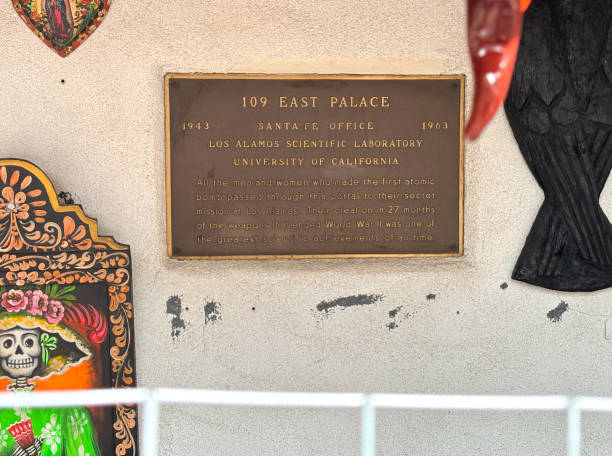 Santa Fe, NM: A memorial sign on a building in downtown Santa Fe (at 109 East Palace Ave), where the 1940s Manhattan Project scientists checked in before they went to Los Alamos, then a secret location.