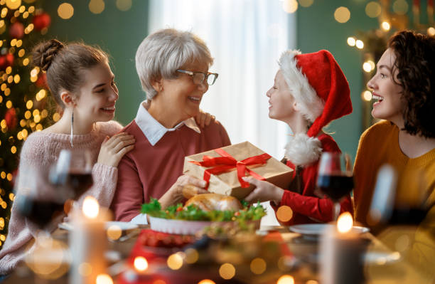 istock family celebrating Christmas 2184268944