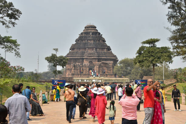 People visiting the Sun Temple, a UNESCO world heritage site, which was built in the 13th century under Kalinga dynasty. Konark, Orissa India - March 10, 2023: People visiting the Sun Temple, a UNESCO world heritage site, which was built in the 13th century under Kalinga dynasty and designed as a gigantic chariot of the Sun God. india jaipur rajasthan traditional culture stock pictures, royalty-free photos & images