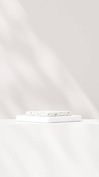 istock Background featuring an empty product display mockup with a beige backdrop and abstract geometric platforms designed for showcasing merchandise in portrait orientation. 2184270608