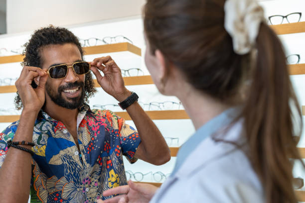 istock A customer buys glasses from an optician 2184275710