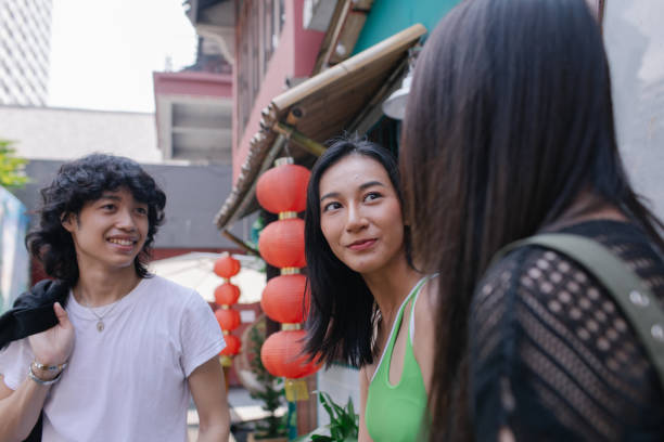 istock Asian Friends Taking A Break Exploring The City Together 2184278037