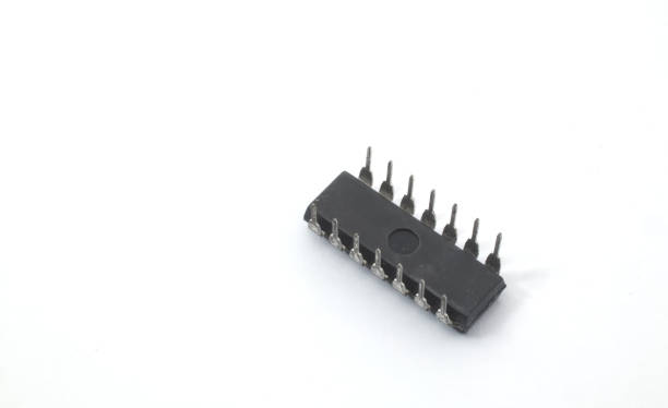 istock Bottom view of an Integrated Circuit (IC) for DIY electronics purposes on a white background. Electronic component parts. 2184279595