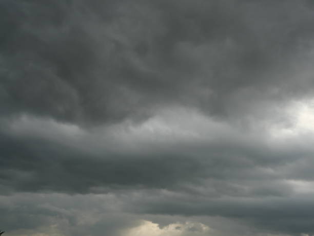 istock Cumulonimbus cloud formations on tropical sky 2184280319