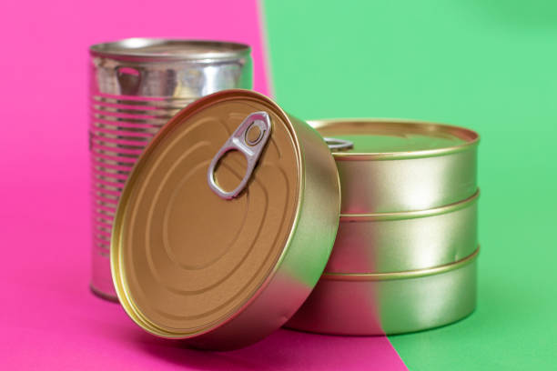 istock A Group of Stacked Tin Cans on Split Green and Cyan Background 2184281000