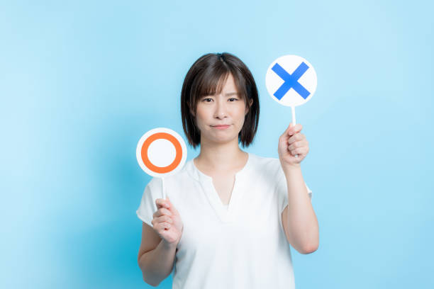 istock A woman holding a plate with a circle cross 2184282345