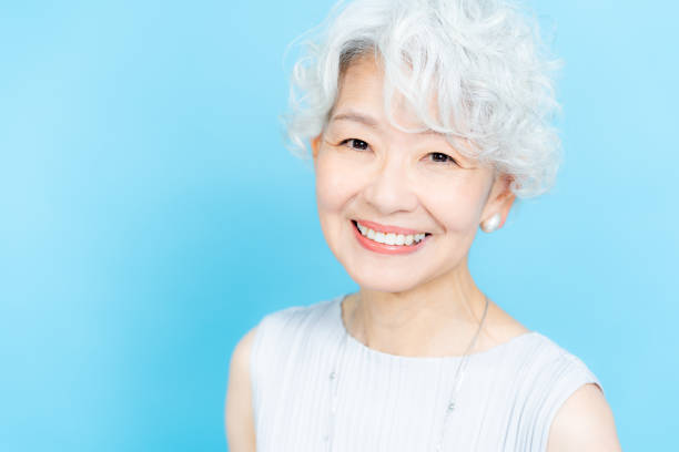 istock Senior woman doing skin care 2184282707