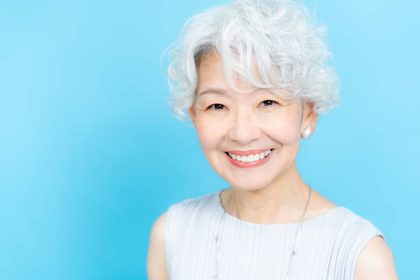 istock Senior woman doing skin care 2184282715