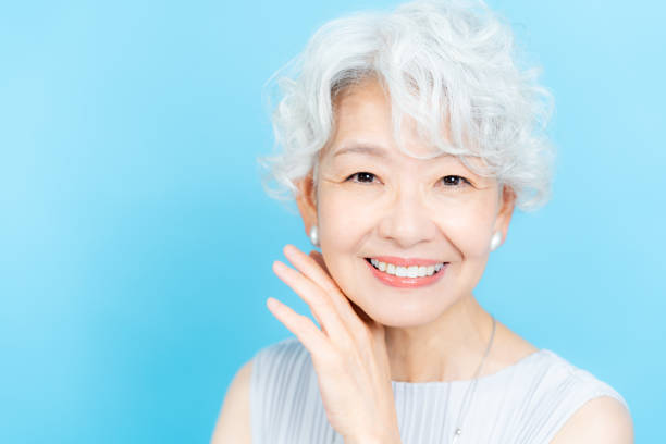 istock Senior woman doing skin care 2184282718