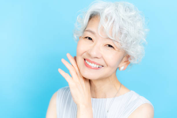 istock Senior woman doing skin care 2184282719
