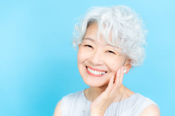 istock Senior woman doing skin care 2184282721