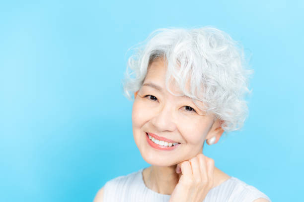 istock Senior woman doing skin care 2184283027