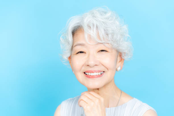 istock Senior woman doing skin care 2184283029