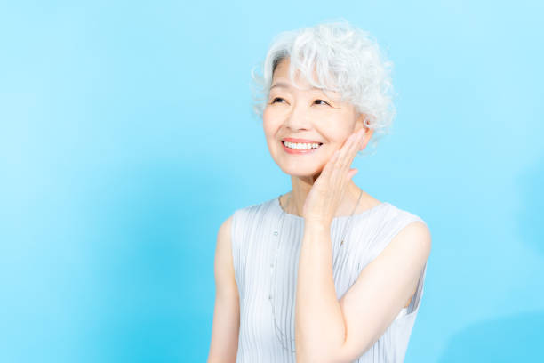 istock Senior woman doing skin care 2184283041
