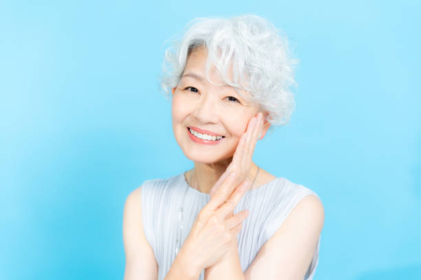 istock Senior woman doing skin care 2184283052