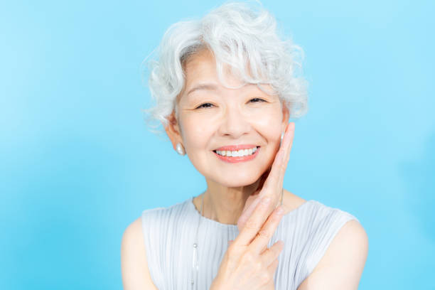 istock Senior woman doing skin care 2184283054