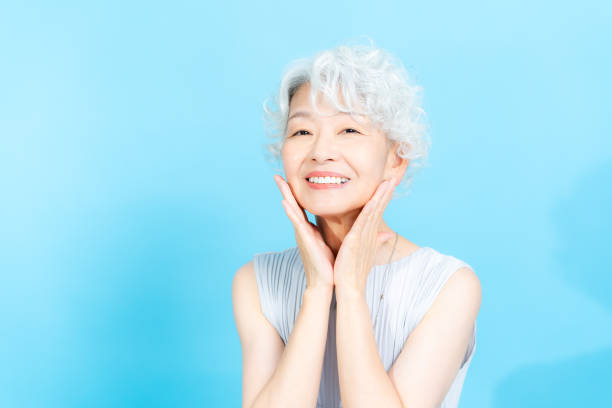 istock Senior woman doing skin care 2184283055