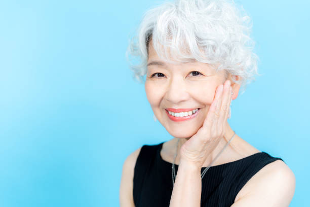 istock Senior woman doing skin care 2184283059