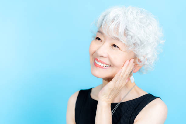 istock Senior woman doing skin care 2184283060