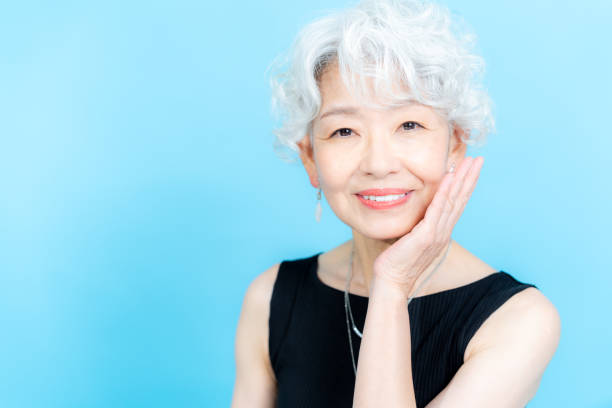 istock Senior woman doing skin care 2184283086