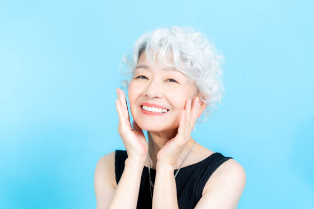 istock Senior woman doing skin care 2184283120