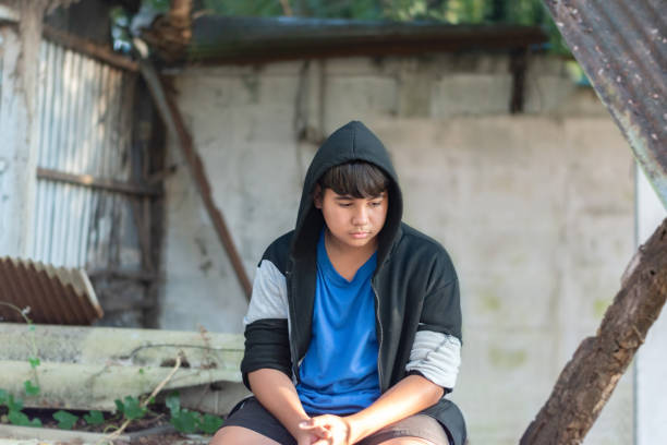 istock Asian boy with bad feeling lifestyles 2184285675
