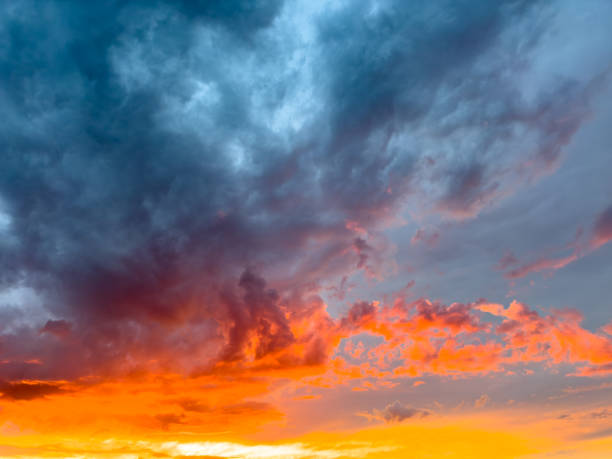 istock A beautiful orange and blue sky with clouds 2184285694