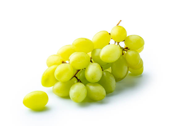 One green bunch of grapes isolated on a white background. High angle view, studio shot.