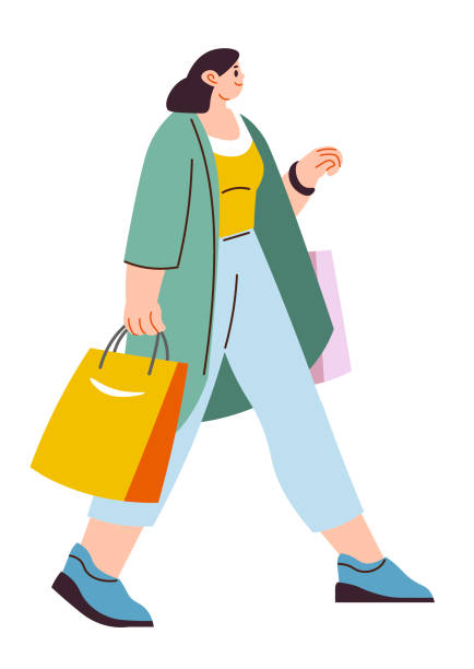 istock Woman walking with shopping bags from boutique 2184289332