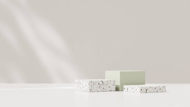 istock Minimal scene with a white wall and 3D render of a mockup featuring terrazzo and green-colored podiums, along with abstract geometric platforms, designed for showcasing merchandise in landscape 2184292566
