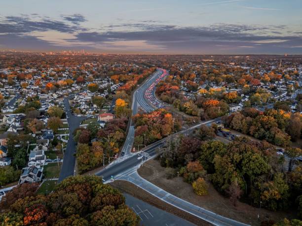 istock Aerial Suburban Sunset with Autumn Foliage 2184293578