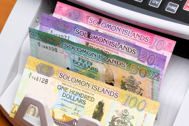 istock Solomon Islands dollar in the counting machine 2184294624