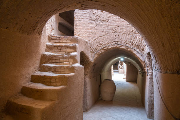istock A stone tunnel featuring stairs that prominently, Saryazd Castle, Iran 2184294729