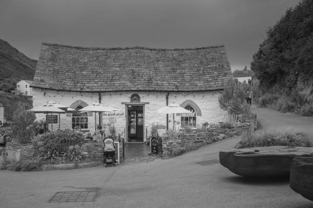 boscastle, United Kingdom – May 11, 2024: A cozy cafe in Boscastle with a stormy sky in the background