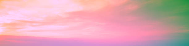 istock Colorful cloudy sky at sunset. Gradient color. Sky texture. Abstract nature background. Horizontal banner 2184299012
