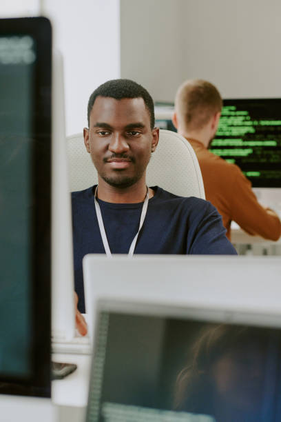istock Young Black Man Working In IT Company Office 2184300743
