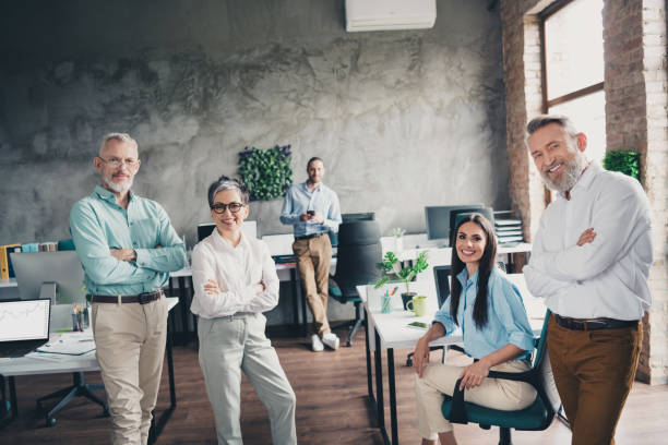 istock Photo of teamwork people working together crossed hands confident comfortable modern office loft room interior indoors workspace 2184301888
